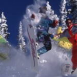 four skiers and snowboarders at Steamboat in the 1990s