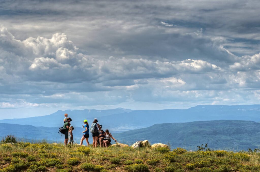 A group of hikers atop Steamboat Resort.