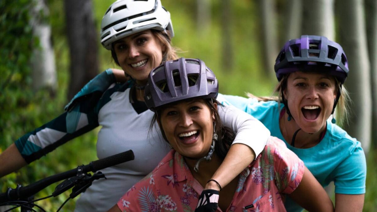 Three female mountain bikers at Steamboat Resort.