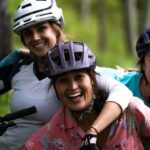Three female mountain bikers at Steamboat Resort.