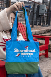 A refleece bag made from recycled uniforms.